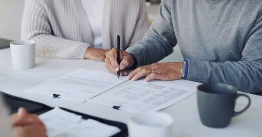 Family discussing estate planning with an attorney in Houston - estate planning attorney Houston